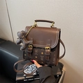 Dark brown retro PU leather backpack with vintage bear pattern and metal lock charm - Coffee with Pendant