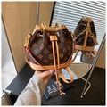 Mini sac seau vintage en toile monogramme marron avec bordure en cuir et cordon - Marron