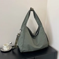 Green and white checkered canvas tote bag with adjustable shoulder strap and knot handle - Green