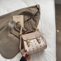 Vintage style beige leather crossbody bag with brown bear patterns and gold hardware - White Without Pendant