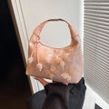 Pink embroidered dumpling handbag with 3D mesh butterfly details and metal clasp - Pink