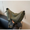 Olive green crescent shoulder bag in soft synthetic fabric with adjustable wide strap - Green