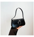 Glossy black rivet crossbody bag with silver cross hardware and chain details - Black