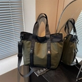 Army green large nylon tote bag with black straps and adjustable shoulder strap for daily use - Green