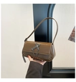 Brown leather shoulder bag with metallic cross decoration and punk rivet detailing - Brown