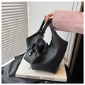 Elegant black lychee textured leather bucket bag with matching mini pouch and silver clasp - Black