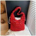 Detail of red hollow woven tote bag with white drawstring liner and thick rope texture - Red