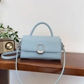 Light blue woven pattern handbag with silver metal buckle and detachable strap - Blue