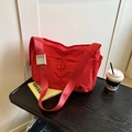 Vibrant red nylon crossbody messenger bag with adjustable strap and drawstring pocket - Red