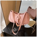 Chic pink crescent underarm bag in matte leather featuring a sleek buckle strap detail - Pink