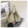 Detail of drawstring bucket bag in olive green nylon with adjustable shoulder strap - Green