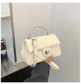 Detail of cream white quilted crossbody bag with silver chain handle and twist-lock - White