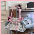 Detail of silver rectangular sequins on a tote bag with pink leather handle accents - Pink