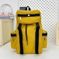 Versatile mustard yellow travel backpack with multiple zippered pockets and flip-top cover - Yellow