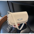 Chic beige crossbody bag featuring woven fabric flap and metal fashion plaque detail - Black