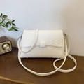 Retro cream white shoulder bag with geometric embossed leather and silver buckle - White