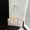 Minimalist cream white leather tote bag with knotted handle and silver hardware detail - White