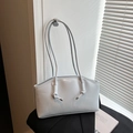 Chic light blue patent leather tote bag with glossy finish and slim shoulder strap - Blue