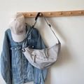 Light grey nylon crescent crossbody bag featuring adjustable straps and embroidery - Small / Gray