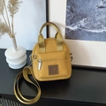 Waterproof yellow nylon mini crossbody handbag with adjustable strap and logo detail - Yellow Small