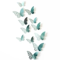 Makroansicht von blauen 3D Schmetterling Wandaufklebern mit metallischen Doppelflügeln - Set / Spiegel Indigo