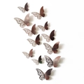 Detailed macro view of 3D rose gold butterfly wall stickers with intricate laser-cut hollow patterns - Set / Mirror Grey