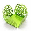 Macro view of green laser-cut floral rose patterns on metallic reflective cake lace wraps - Mirror Yellow Green