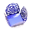 Detail showing royal blue laser-cut hollow rose pattern on decorative cupcake wrapper - Mirror Dark Blue