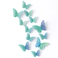 Set of 12 3D hollow butterfly wall stickers with blue gradient metallic finish on white wall - 24 Pieces / Rainbow Blue