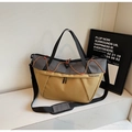 Detail view of large capacity tote bag with yellow canvas and grey checkered fabric stitching - Khaki