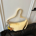 Light yellow lychee leather crescent hobo bag with elephant charm and adjustable strap - Light Yellow (With Pendant)