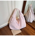 Pale pink oversized tote bag featuring multi-zipper pockets and pleated nylon fabric - Pink