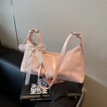 Pink patent leather shoulder bag with decorative pearl and lace bow charm - With Charm / Pink