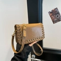 Caramel brown woven faux leather crossbody bag with metallic eyelet detailing - Brown