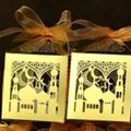 Golden laser-cut Ramadan gift boxes with mosque patterns and elegant ribbon bow detail - European Style (XTH-419) / Gold