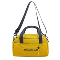 Versatile bright yellow nylon crossbody bag with navy blue handles and adjustable strap - Yellow
