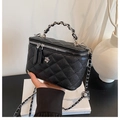 Chic black quilted bucket bag with camellia metal ornament and chain strap handle - Black
