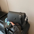 Small black pebble grain flap crossbody bag with a blue butterfly charm and strap - Black (With Charm)