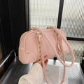 Pink lychee grain leather shoulder bag with long handles and silver metal hardware - Pink
