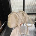 Chic beige large capacity boston bag with lychee texture and round leather tag - Off White