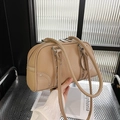 Beige lychee leather Boston shoulder bag with rivet accents and round logo tag - Khaki