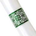 Macro detail of laser-cut green metallic napkin ring on a white satin rolled cloth - Double-Sided Reflective Green