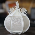 Detailed laser-cut white paper lantern featuring elegant rose patterns and couple silhouette - Ivory