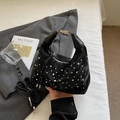 Chic black pleated dumpling bag with silver rhinestones and a metallic handle - Black