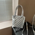 Silver quilted bucket bag with metallic finish and star charms for women - Silver