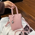 Pink lychee texture crossbody bag with heart pendant and fashion embossing - Pink