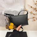 Black litchi grain leather crossbody bag with cute elephant charm and thin strap - Black with Pendant