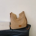 Khaki woven tote bag with brown leather straps and mesh pattern for summer beach vacations - Khaki