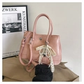 Pink PU bucket bag detail with delicate lace bow pearl charm and dual handle straps - With Charm / Pink
