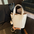 Creamy white tote bag with segmented design, silver chain, and matching coin purse charm - Off White